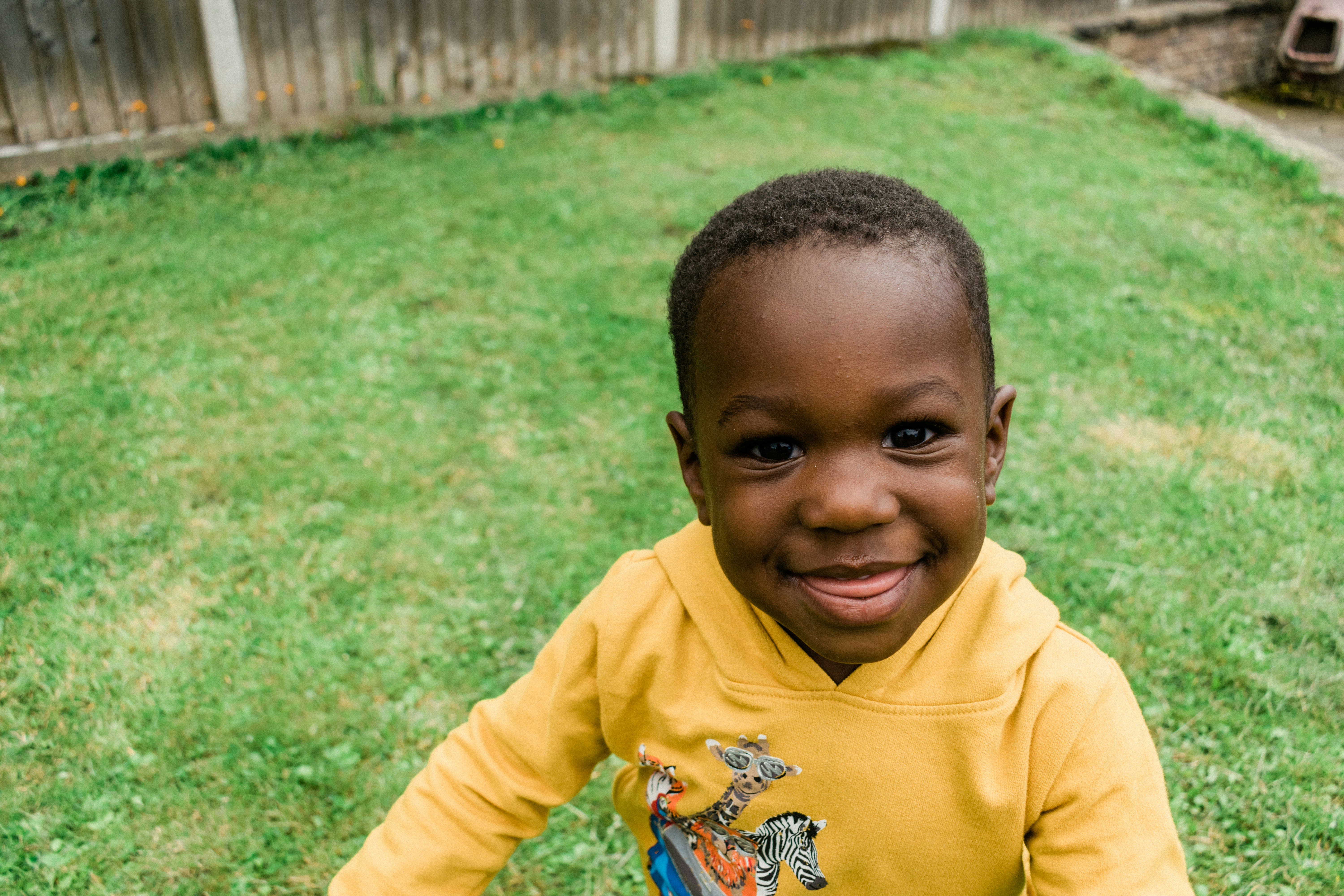 Small kid with yellow shirt